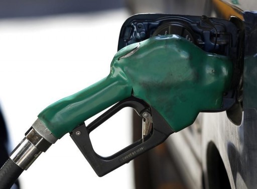 FILE - A gas nozzle is used to pump petrol at a station in New York February 22, 2011. REUTERS/Shannon Stapleton