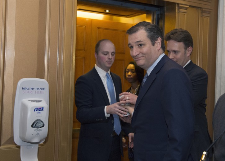 Republican presidential candidate Sen. Ted Cruz, R-Texas arrives for a Senate vote, Wednesday, Jan. 20, 2016, on Capitol Hill in Washington. (AP Photo/Molly Riley)