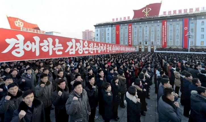 People take part in a mass rally at Kim Il Sung Square in Pyongyang to mark North Korean leader Kim Jong Un's New Year Address in this photo released by North Korea's Korean Central News Agency (KCNA) on January 5, 2016.     REUTERS/KCNA