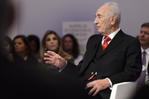 File: Former Israeli president Shimon Peres speaks 22 January 2015. EPA/LAURENT GILLIERON