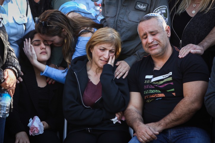 Friends and family attend the funeral of Hadar Cohen, 19, at the cemetery in Yehud, central Israel on February 4, 2016, Hadar Cohen, 19, an Israeli border police officer died yesterday, after being shot and stabbed by three Palestinian attackers, who were shot and killed by Israeli security forces at the scene. Photo by Yonatan Sindel/Flash90