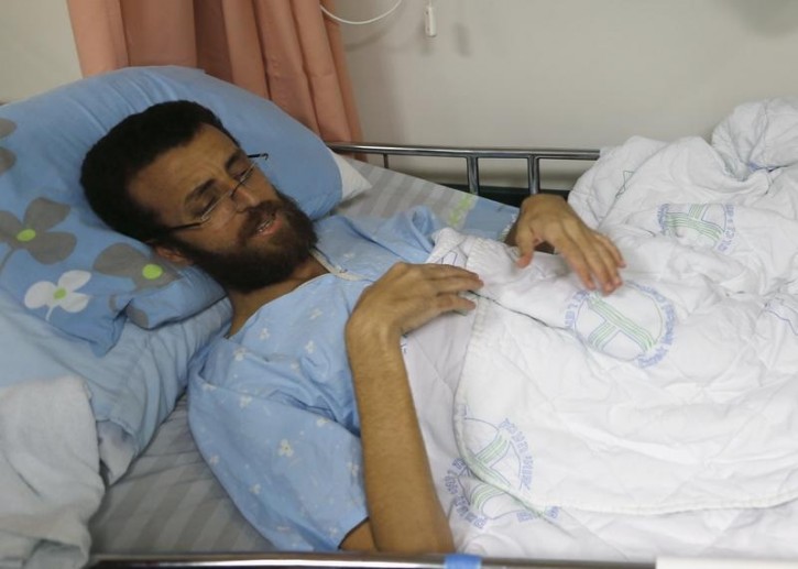 Palestinian journalist Mohammed al-Qeq, 33, who has been on hunger strike for more than 70 days to protest at his administrative detention in an Israeli jail, is seen at Haemek hospital in the northern Israeli city of Afula February 5, 2016. REUTERS/Ammar Awad 