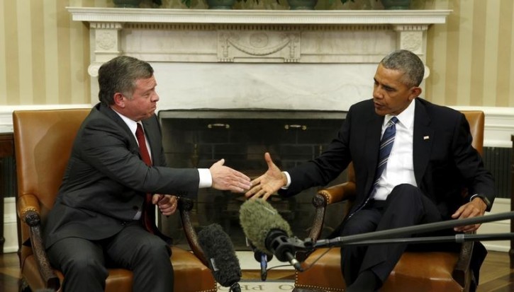 U.S. President Barack Obama shakes hands with King Abdullah of Jordan during their meeting in the Oval Office of the White House in Washington February 24, 2016. REUTERS/Kevin Lamarque 