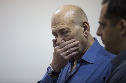 File: Former Israeli Prime Minister Ehud Olmert reacts at the Jerusalem District Court, in Jerusalem. EPA/HEIDI LEVINE / POOL