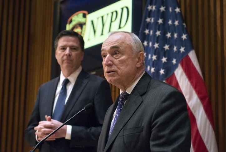FILE - New York City Police Commissioner William J. Bratton (R) speaks alongside FBI Director James B. Comey (L) during a news conference after speaking about terrorism at the NYPD Shield Conference in the Manhattan borough of New York, December 16, 2015. REUTERS/Darren Ornitz 