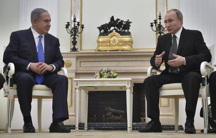  Russian President Vladimir Putin (R) talks to Israeli Prime Minister Benjamin Netanyahu (L) during their meeting in the Kremlin in Moscow, Russia, 21 April 2016. Israeli Prime Ministeris on a working visit in Moscow.  EPA/ALEXANDER 