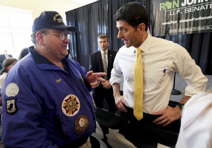 House Speaker Paul D. Ryan, R-Wis., talks with a supporter during a campaign rally for U.S. Sen. Ron Johnson, R-Wis., during Johnsons U.S. Senate campaign kickoff tour Thursday, May 5, 2016 in Burlington, Wis. (Gregory Shaver/The Journal Times via AP) 