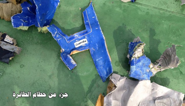 This picture posted Saturday, May 21, 2016, on the official Facebook page of the Egyptian Armed Forces spokesman shows part of the wreckage from EgyptAir flight 804. Search crews found floating human remains, luggage and seats from the doomed EgyptAir jetliner Friday but face a potentially more complex task in locating bigger pieces of wreckage and the black boxes vital to determining why the plane plunged into the Mediterranean. Arabic reads:  Part of plane wreckage.  (Egyptian Armed Forces via AP)