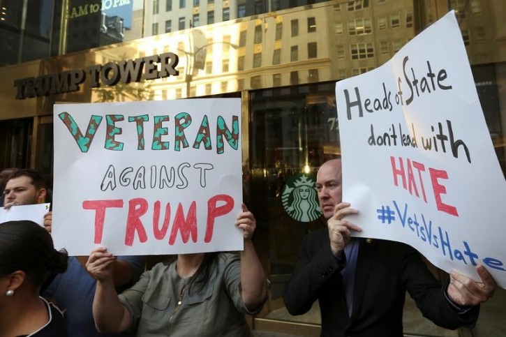 A small number of Veteran protesters demonstrate outside Trump Tower in New York, U.S., May 23, 2016.  REUTERS/Carlo Allegri 