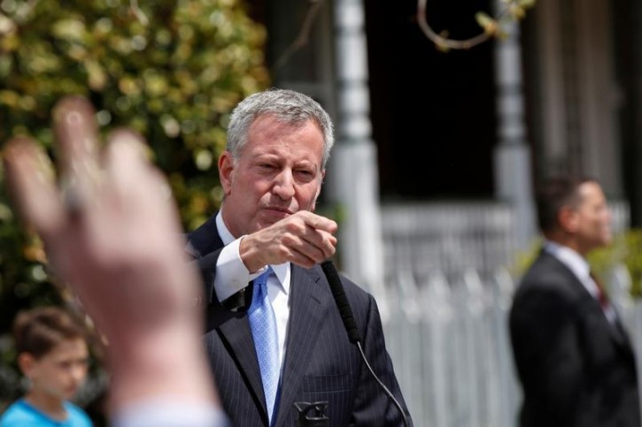 FILE - New York Mayor Bill de Blasio gestures during a media briefing in Brooklyn, New York, U.S., April 25, 2016. REUTERS/Shannon Stapleton