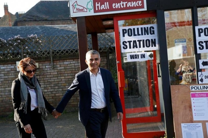 Sadiq Khan, Britain's Labour Party candidate for Mayor of London and his wife Saadiya leave after casting their votes for the London mayoral elections at a polling station in south London Britain May 5, 2016. REUTERS/Stefan Wermuth     
