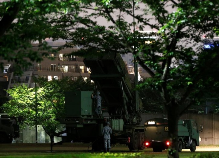 Japan Self-Defence Forces soldiers are seen near Patriot Advanced Capability-3 (PAC-3) missiles at the Defence Ministry in Tokyo, Japan, May 30, 2016. REUTERS/Issei Kato