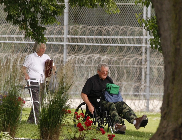 Former Speaker of the House Dennis Hastert, right, reports to the Federal Medical Center in Rochester, Minn., on Wednesday, June 22, 2016, to begin serving a 15-month sentence in a hush money case. (AP photo/Rochester Post-Bulletin, Andrew Link)