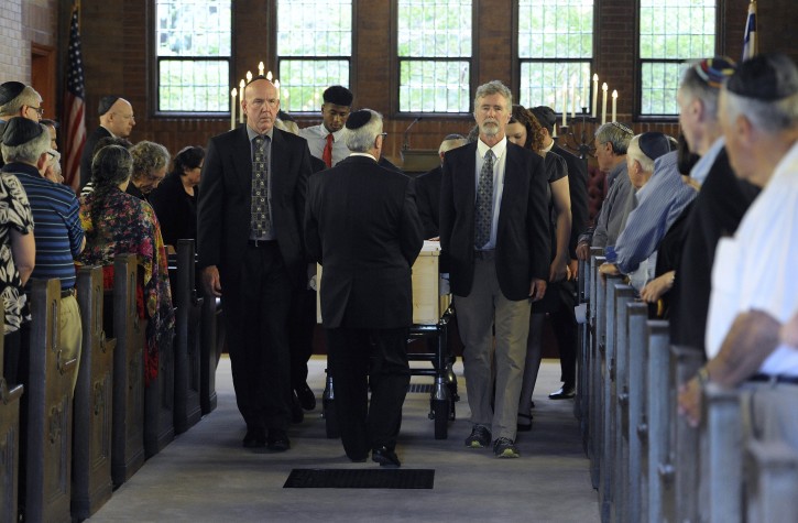 In a photo from Sunday, June 26, 2016, pallbearers move the casket of Lane Lesko, at the Davidson/Hermelin Chapel at Clover Hill Park Cemetery in Birmingham, Mich. The mother of the 19-year-old Michigan man shot by police in New Hampshire says she was told by the state Attorney General's office that he was brandishing a BB gun and running away when he was shot. Lesko, of Ann Arbor, Mich., died of a single gunshot wound on Tuesday on Route 136 in Peterborough. (AP Photo/Jose Juarez)