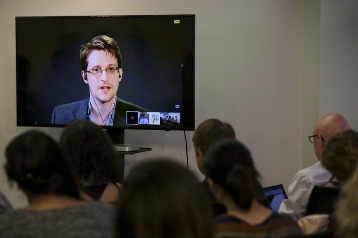 FILE - American whistleblower Edward Snowden delivers remarks via video link from Moscow to attendees at a discussion regarding an International Treaty on the Right to Privacy, Protection Against Improper Surveillance and Protection of Whistleblowers in Manhattan, New York September 24, 2015. Reuters