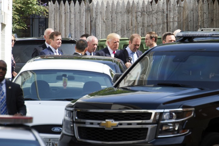 Republican presidential candidate Donald Trump departs a meeting with Republican House members at the Capitol Hill Club in Washington, Thursday, July 7, 2016. (AP Photo/Cliff Owen)