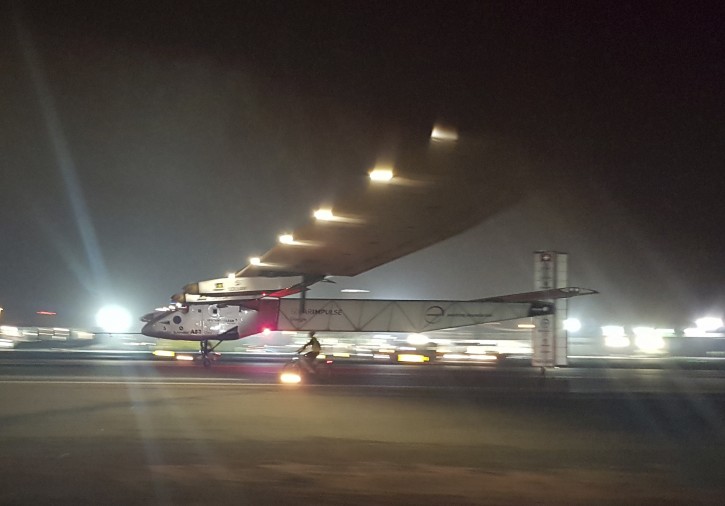 The Solar Impulse 2 plane lands in an airport in Abu Dhabi, United Arab Emirates, early Tuesday, July 26, 2016, marking the historic end of the first attempt to fly around the world without a drop of fuel, powered solely by the sun’s energy. Solar Impulse Chairman and pilot Bertrand Piccard was at the controls of the single-seater when it landed at the Al Bateen Executive Airport. Piccard traded off piloting with co-founder Andre Borschberg in the epic journey that took more than a year to complete. (AP Photo/Aya Batrawy)