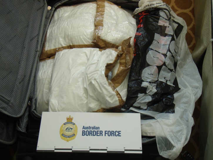 In this photo released by Australia Boarder Force, a suitcase filed with cocaine after it was sized by customs onboard the MS Sea Princess Sunday, Aug. 28, 2016. Three Canadian cruise ship passengers were charged with drug smuggling Monday after Sydney police allegedly found 95 kilograms (209 pounds) of cocaine in their cabin luggage.(Australian Boarder Force via AP)
