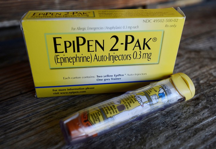 FILE - This Oct. 10, 2013, file photo, shows an EpiPen epinephrine auto-injector, a Mylan product, in Hendersonville, Texas. Mylan reports financial results Tuesday, Aug. 9, 2016. (AP Photo/Mark Zaleski, File)