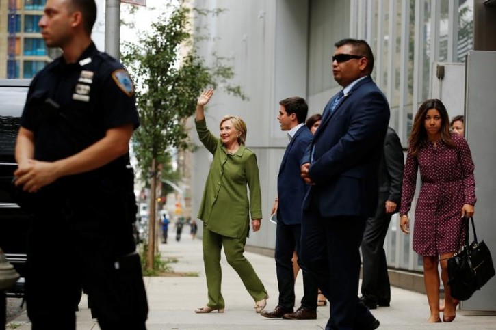 FILE - U.S. Democratic presidential nominee Hillary Clinton waves as she departs a gathering of law enforcement leaders outside of John Jay College of Criminal Justice in New York, U.S., August 18, 2016.  REUTERS/Lucas Jackson