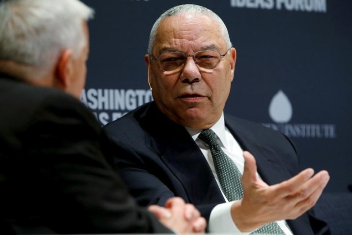 FILE - Former U.S. Secretary of State Colin Powell (R) takes part in an onstage interview with Aspen Institute President and CEO Walter Isaacson (L) at the Washington Ideas Forum in Washington, September 30, 2015. REUTERS/Jonathan Ernst/File Photo
