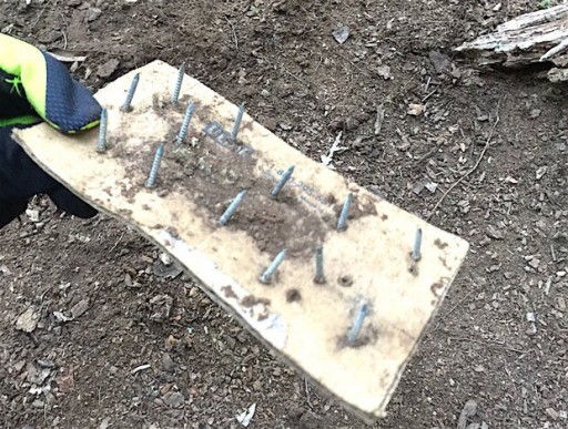 A board with screws found in High Mountain Park. Police say booby-traps have been found along a trail used for bikers and hikers. (Wayne PD) 