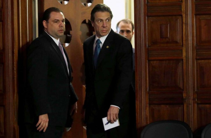 FILE - In this April 26, 2013, file photo, New York Gov. Andrew Cuomo, right, and Joseph Percoco, executive deputy secretary, stand at a news conference in Albany, N.Y. (AP Photo/Mike Groll, File)