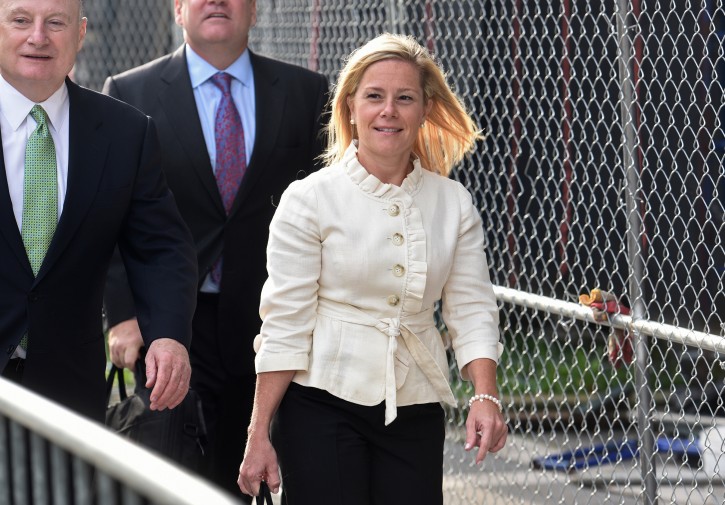 Bridget Kelly enters the courthouse for the start of the trial, Tuesday, Sept. 20, 2016 in Newark, N.J. Bill Baroni, a Port Authority of New York and New Jersey official, and Bridget Kelly, Christie's former deputy chief of staff, are charged with civil rights violations, conspiracy and wire fraud. Prosecutors say they caused the traffic jams by reducing the number of access lanes to the bridge from three to one without notifying Fort Lee officials. (Chris Pedota/The Record via AP)