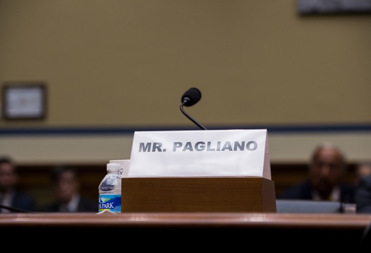 The name plate for witness Bryan Pagliano, former senior adviser, Information Resource Management, State Department, who did not appear, sits on the witness table on Capitol Hill in Washington, Tuesday, Sept. 13, 2016, during a hearing of the House Oversight and Government Reform Committee on 'Examining Preservation of State Department Records.'  (AP Photo/Molly Riley)