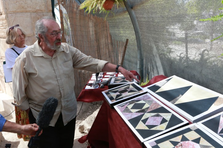 Dr. Gabriel Barkay, co-founder and director of the Temple Mount Sifting Project in presentation of the restored tiles of the Second Temple during Herodian Rule