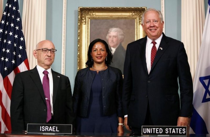 FILE - U.S. National Security Advisor Susan Rice (C) greets Israeli Acting National Security Advisor Jacob Nagel (L) and Undersecretary of State Tom Shannon (R) after their signing ceremony for a new ten year pact on security assistance between the two nations at the State Department in Washington, U.S., September 14, 2016.   REUTERS/Gary Cameron