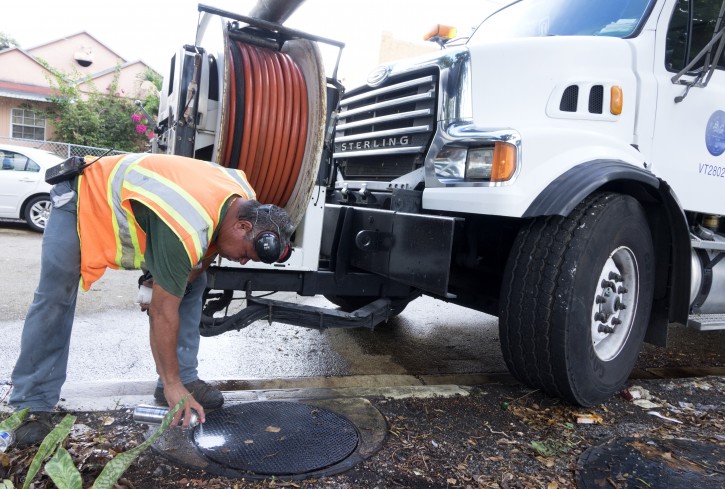 FILE - A worker for the City of Miami marks a man hole after cleaning the sewer system in the Wynwood neighborhood of Miami, Florida, USA, 16 August 2016, as part of efforts to stop the spread of the Zika virus through mosquitoes. EPA