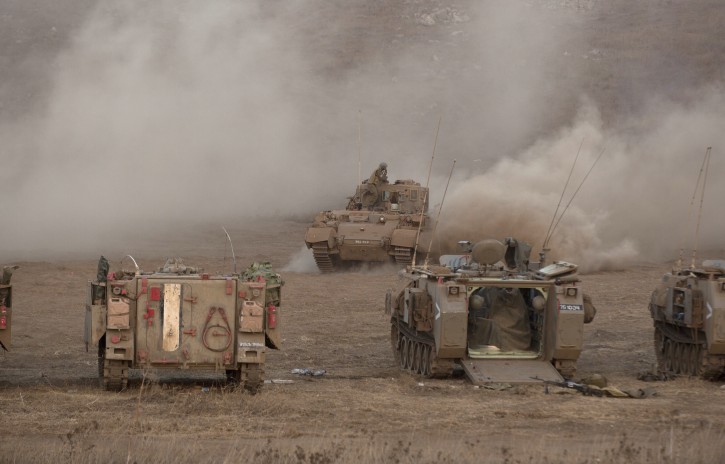Israeli tanks from the armored corps in action during training in the center of the Golan Heights, near the Israel border with Syria 07 September 2016. EPA