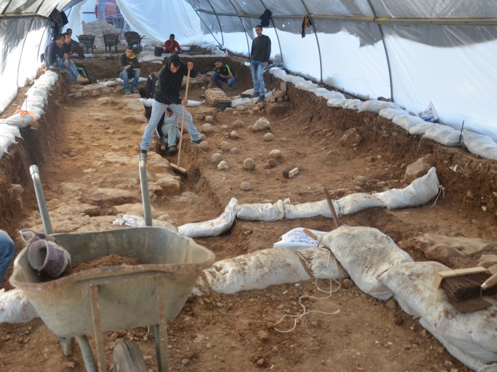 -. The excavation site in the Russian Compound. One can see the sling stones on the floor, which are tangible evidence of the battle that was waged here 2,000 years ago. Photographic credit: Yoli Shwartz, courtesy of the Israel Antiquities Authority.