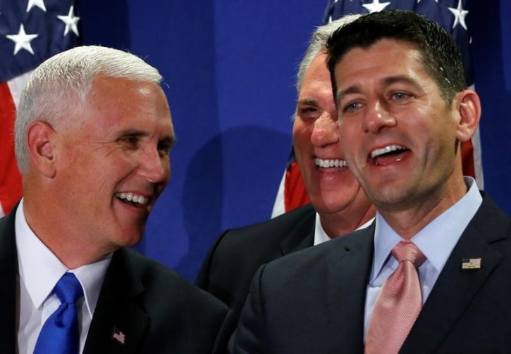 FILE - Republican vice presidential nominee Mike Pence (L-R), Representative Kevin McCarthy (R-CA) and U.S. House Speaker Paul Ryan (R-WI) laugh when a reporter Ryan called on began to ask Pence a question about his criticism of Donald Trump, during a joint news conference following a House Republican party conference meeting in Washington, U.S. September 13, 2016. REUTERS/Jonathan Ernst