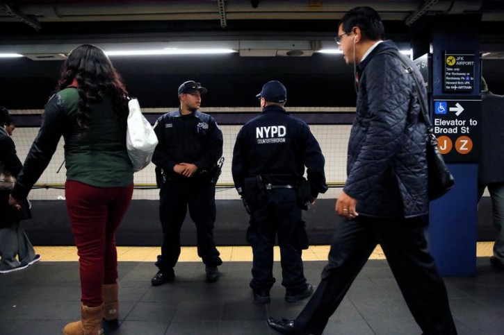 FILE - Members of the New York Police Department's Counterterrorism Bureau monitor Fulton Street subway station ahead of the U.S presidential election in Manhattan, New York, U.S., November 7, 2016.  REUTERS/Andrew Kelly