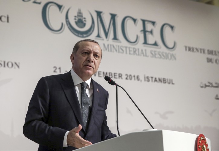 Turkey's President addresses an annual economy and trade meeting of the Organization for Islamic Cooperation in Istanbul, Wednesday, Nov. 23, 2016. Erdogan declared Wednesday that an upcoming vote in the European Parliament on whether to freeze membership talks with Turkey is of "no value" to his country.(Yasin Bulbul, Presidential Press Service, Pool photo via AP)