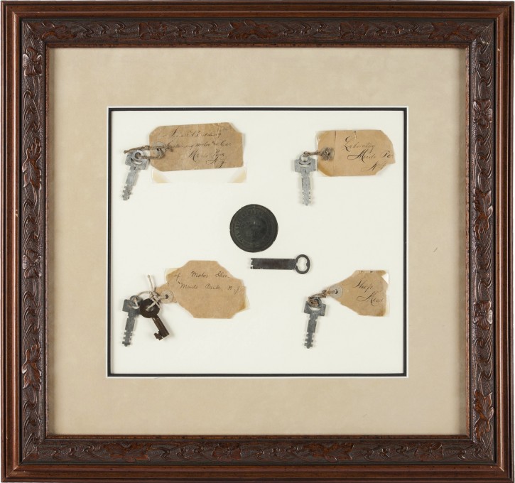 This photo provided by Heritage Auctions shows Thomas A. Edison: Keys to His Menlo Park Laboratory on display.  Six keys in all from the famous inventor's Menlo Park home and work place will be auctioned Saturday, Dec. 3, 2016 in Dallas, along with five lightbulbs, including two that he created. Heritage Auctions will open the bidding on the two lots.  (Heritage Auctions via AP)