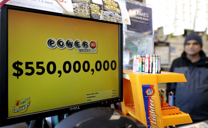 A Powerball lottery sign displays the lottery prizes at a convenience store Thursday, Jan. 4, 2018, in Chicago. An estimated $550 million jackpot is up for grabs on Saturday night's Powerball lottery drawing, making it potentially the 8th largest prize in the nation. (AP Photo/Nam Y. Huh)