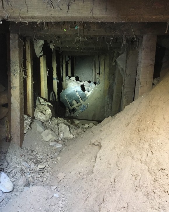 This Thursday, Jan . 25, 2018, photo, provided by the U.S. Border Patrol shows a makeshift tunnel discovered during construction of a roadway near downtown El Paso, Texas, just north of the border with Mexico. Authorities are working to determine the origin and purpose of the tunnel. (U.S. Border Patrol via AP)