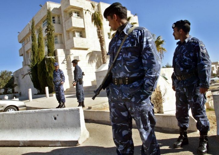 Jordanian police guard Israel's embassy in Amman in this file photo January 6, 2003.
