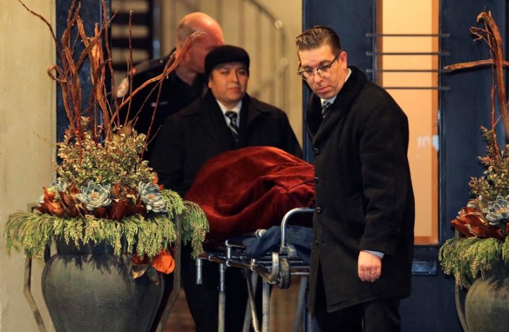 One of two bodies is removed from the home of billionaire founder of Canadian pharmaceutical firm Apotex Inc., Barry Sherman and his wife Honey, who were found dead under circumstances that police now say were murderd in Toronto, Ontario, Canada, December 15, 2017. REUTERS/Chris Helgren 