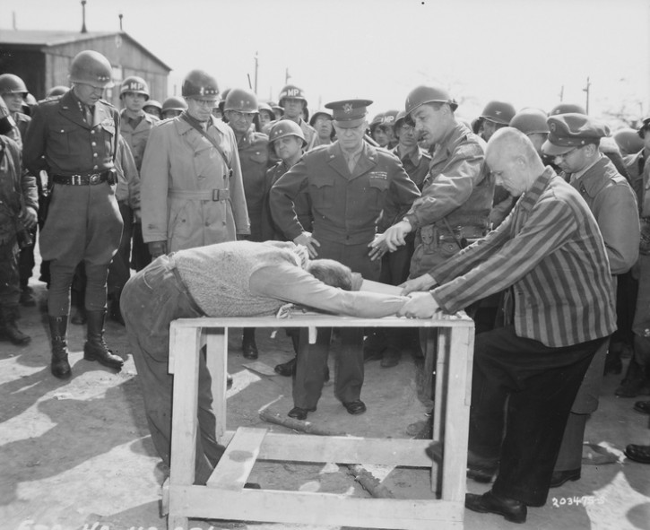 FILE - Generals (from right to left) Dwight Eisenhower, Omar Bradley and George Patton are given a demonstration of one of the methods of torture used by the SS guards in the Gotha concentration camp.AP