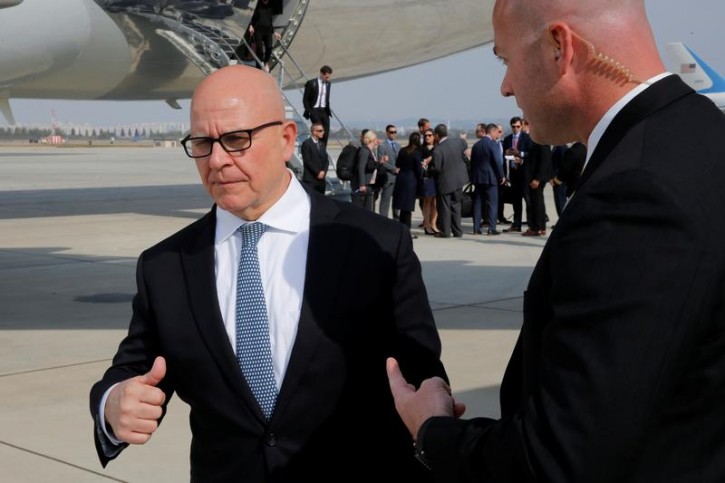 FILE - U.S. National Security Adviser H.R. McMaster speaks with an aide on the tarmac as he arrives with U.S. President Donald Trump aboard Air Force One at Osan Air Base, South Korea November 7, 2017. REUTERS/Jonathan Erns