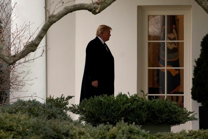 U.S. President Donald Trump walks to the Oval Office of the White House upon his return in Washington, U.S., from Greenbrier, WV, February 1, 2018. REUTERS/Yuri Gripa
