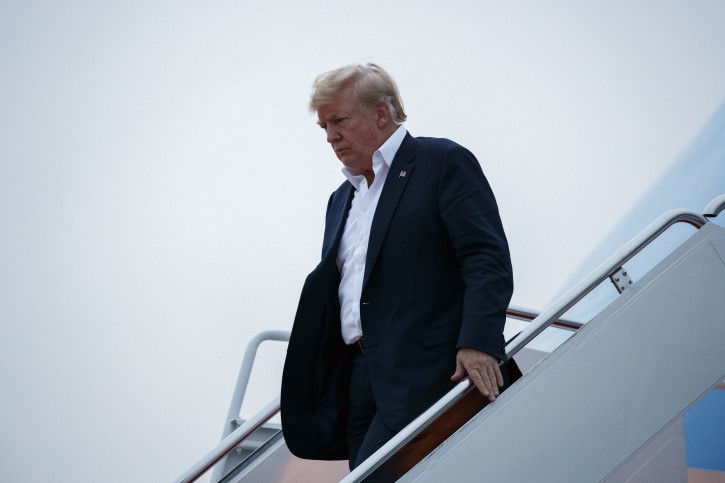President Donald Trump arrives at Andrews Air Force Base after a summit with North Korean leader Kim Jong Un in Singapore, Wednesday, June 13, 2018, in Andrews Air Force Base, Me. (AP Photo/Evan Vucci)President Donald Trump arrives at Andrews Air Force Base after a summit with North Korean leader Kim Jong Un in Singapore, Wednesday, June 13, 2018, in Andrews Air Force Base, Me. (AP Photo/Evan Vucci)