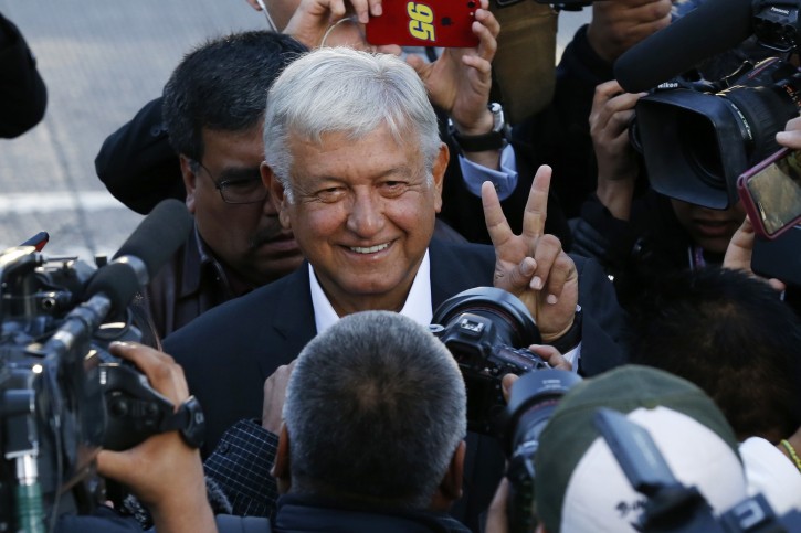 Presidential candidate Andres Manuel Lopez Obrador, of the MORENA party, arrives to a polling station during general election in Mexico City, Mexico, Sunday, July 1, 2018. (AP Photo/Marco Ugarte)