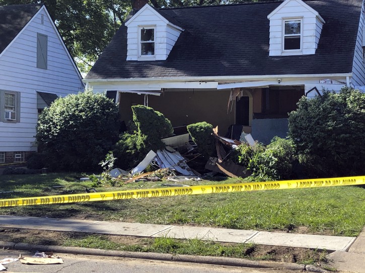 This photo provided by WEWS-TV in Cleveland shows the home in South Euclid, Ohio, where two brothers were found dead of self-inflicted gun shot wounds Aug. 11. AP