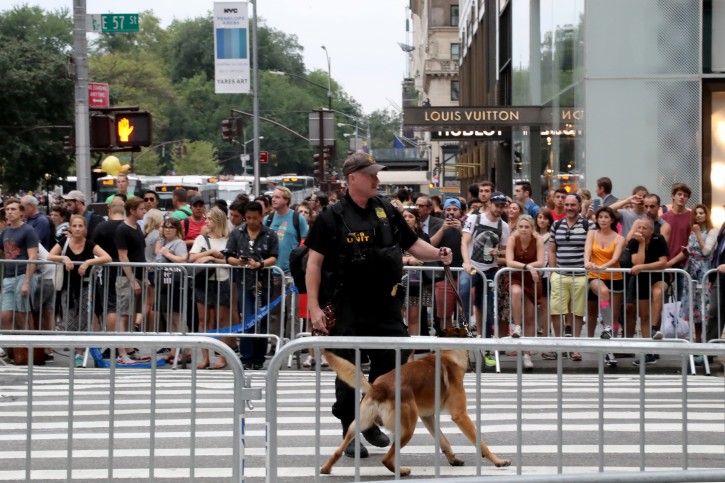 FILE - A United States Secret Service officer and his dog patrol outside of Trump Towers in New York, New York, USA, 14 August 2017.EPA