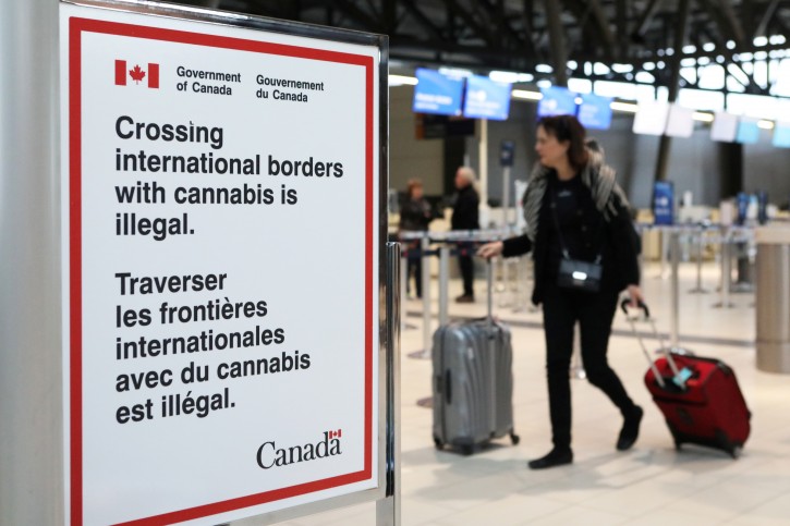  A sign warning travellers about crossing international borders with cannabis is seen at the Ottawa International Airport in Ottawa, Ontario, Canada, October 15, 2018. REUTERS/Chris Wattie